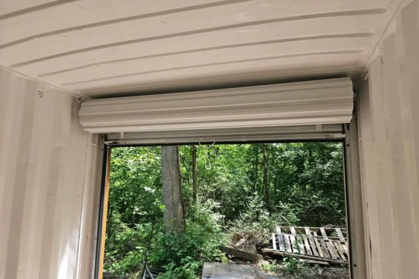 20ft Modified Shipping Container With Rollup Door and Window For Sale - Image 7